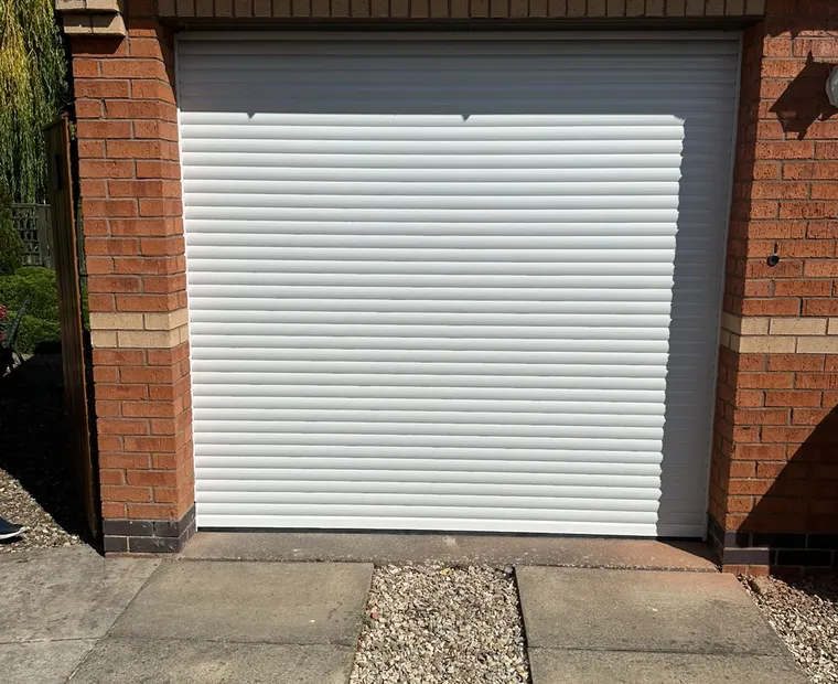 White roller garage door installation