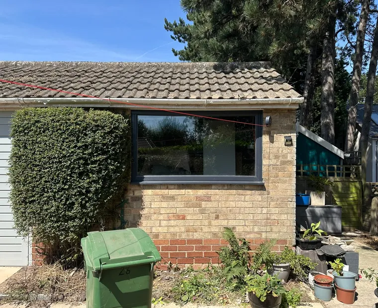Window installation in a brick garage
