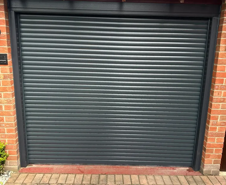 Black roller garage door installation