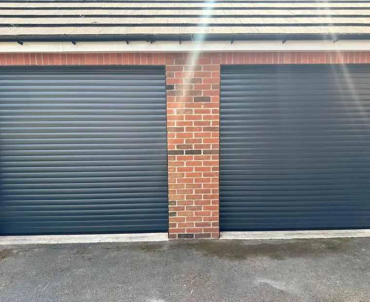 Matching pair of dark garage doors