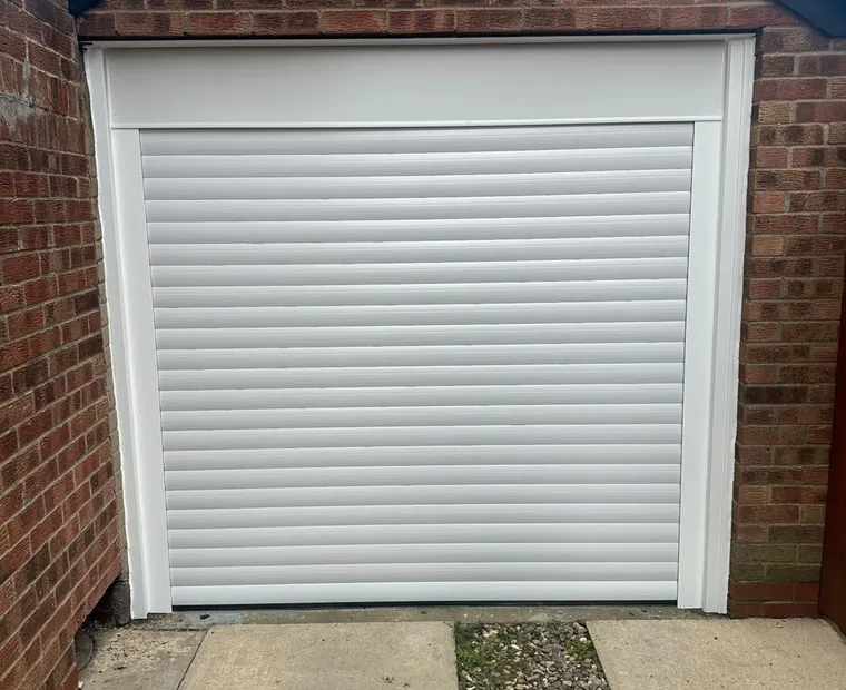 White roller garage door installation