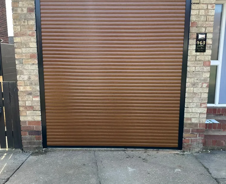 Wood-effect garage door installation
