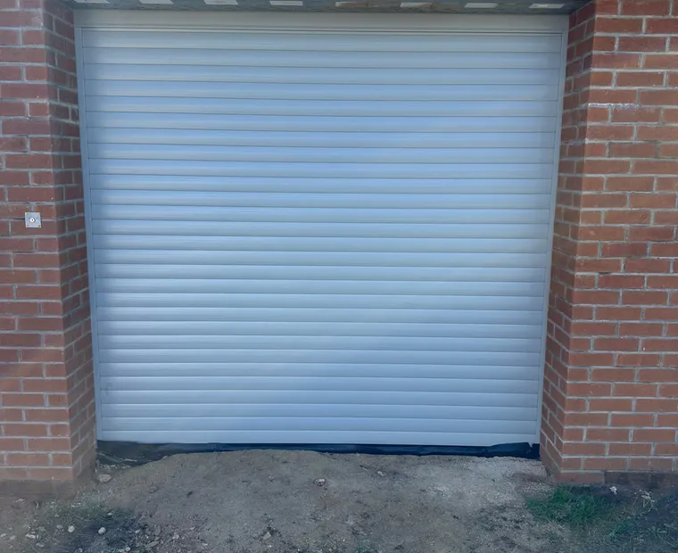Light grey garage door installation